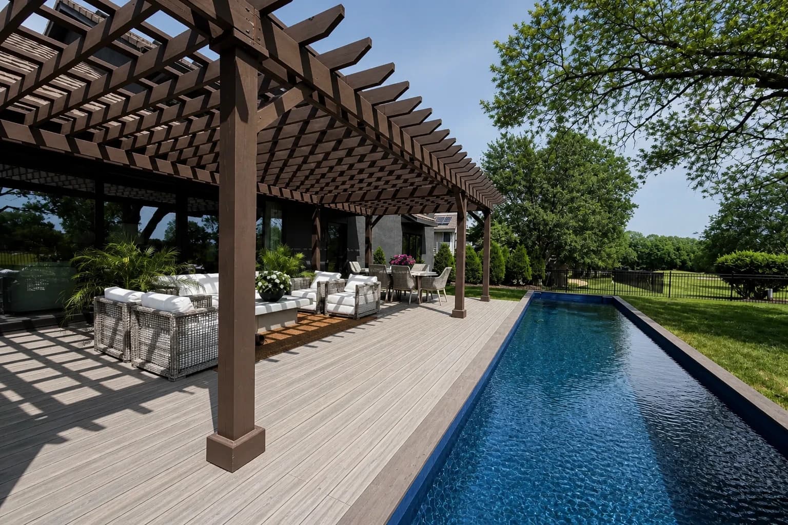 Finished container pool with deck and pergola