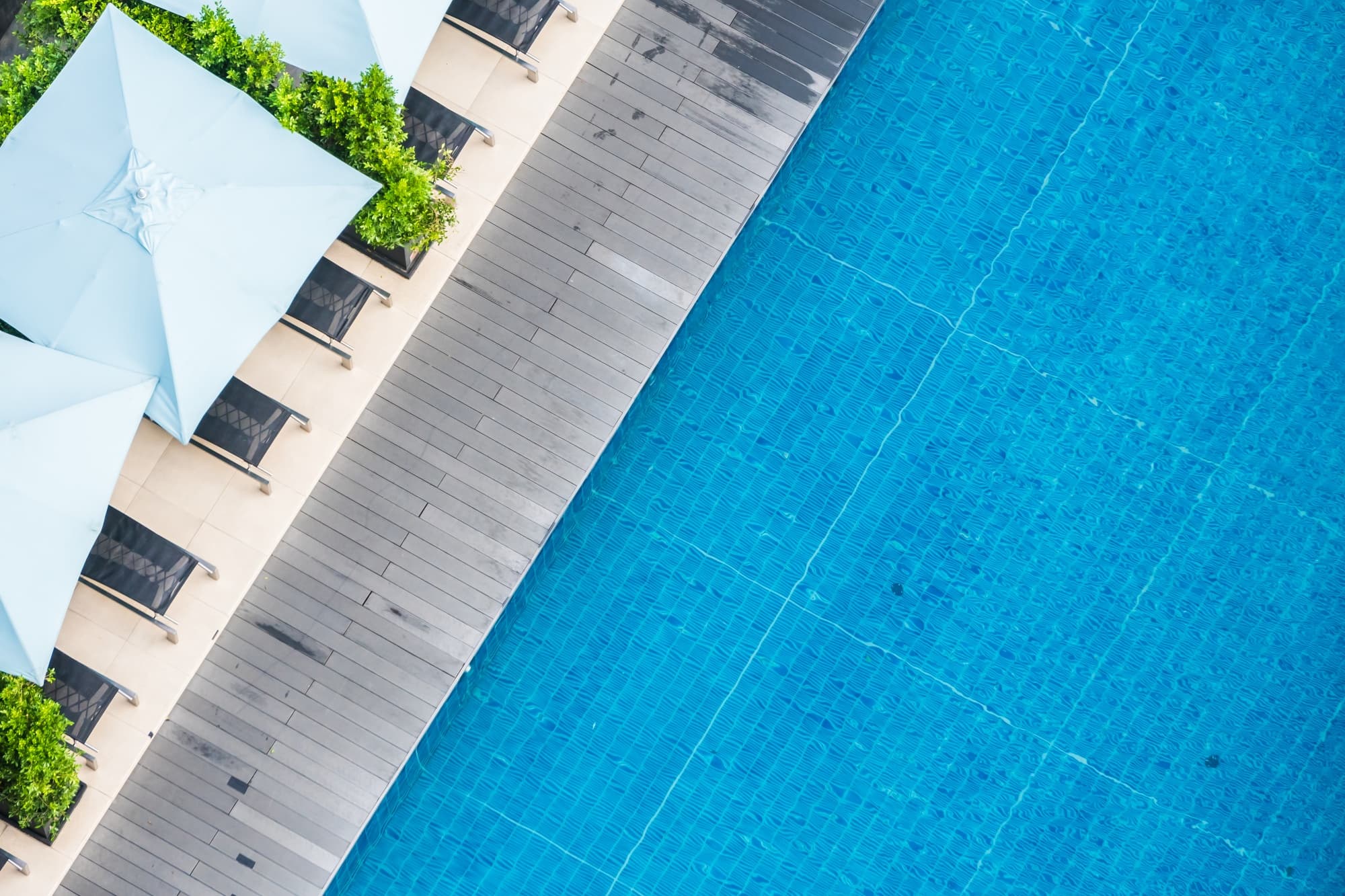 Container pool installed next to a modern home